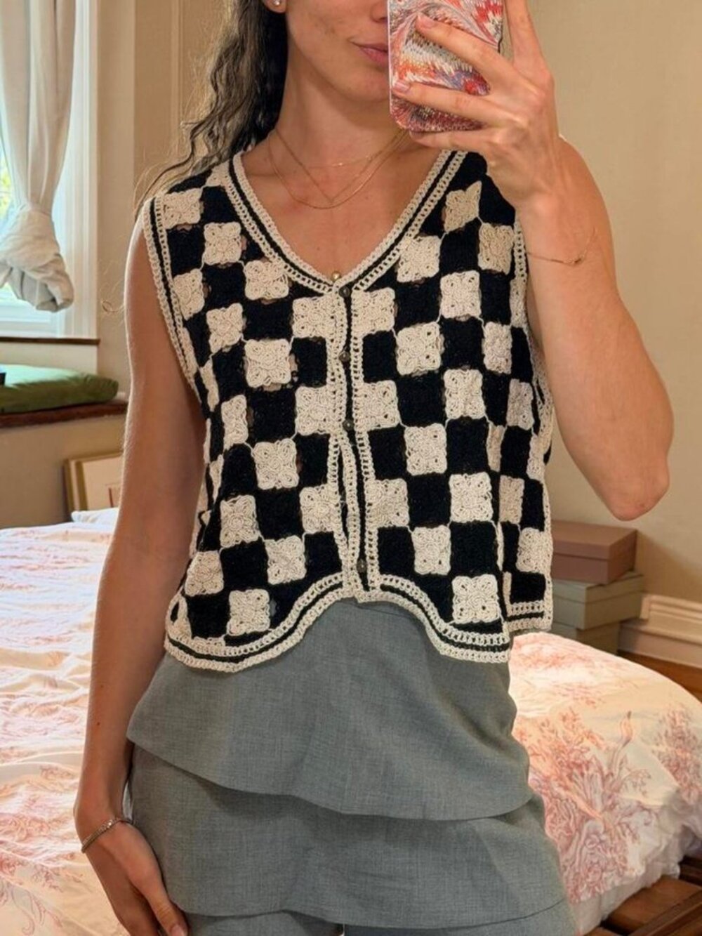 Black and off white white checkered crochet vest with ivory trim